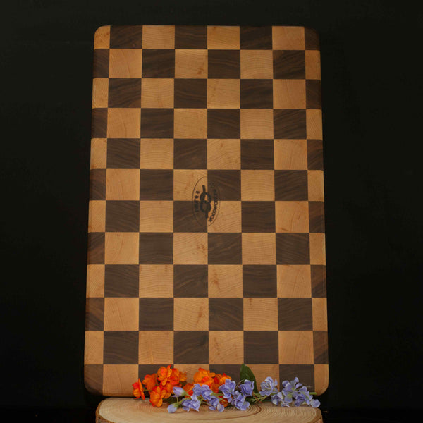 Figure 8 Woodworking Baldy cutting board or butcher block made with end-grain cherry and walnut wood with a checkerboard pattern
