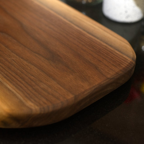Figure 8 Woodworking Glenbow charcuterie board made with live-edge walnut wood