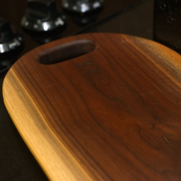 Figure 8 Woodworking Kananaskis charcuterie board made with live-edge walnut wood