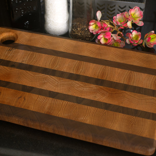 Figure 8 Woodworking Rundle cutting board made with end-grain oak and walnut wood shown in a stripe pattern