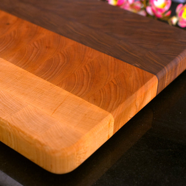 Figure 8 Woodworking Ya Ha cutting board or butcher block made with end-grain maple, cherry and walnut wood with a striped pattern
